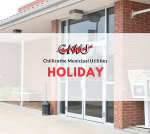 Holiday calendar banner with the CMU building behind